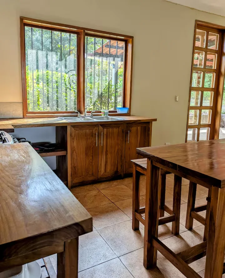 Wooden kitchen counters and dining bar