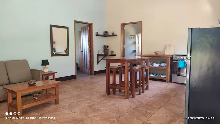 Spacious tiled living and dining area